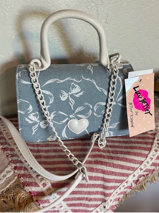 Betsey Johnson Handbags - Betsey Johnson light blue floral crossbody bag with white accents